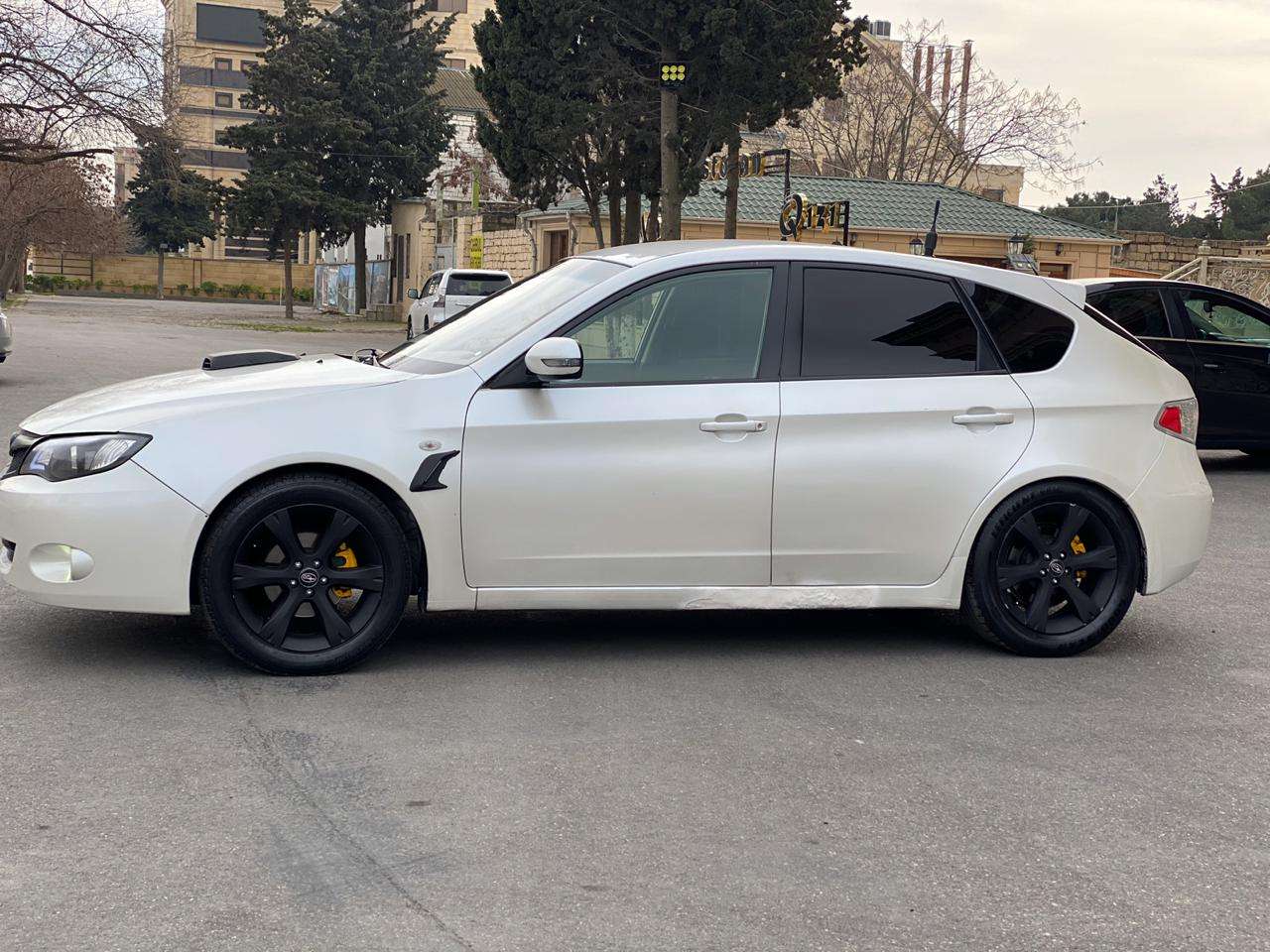 Subaru Impreza, 2007 il, 2.0 L, 260 000 km
