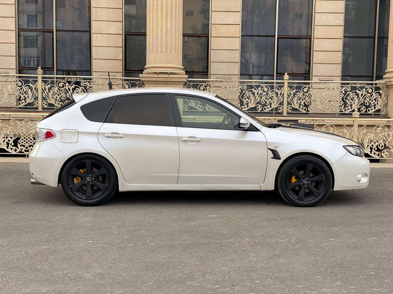 Subaru Impreza, 2007 il, 2.0 L, 260 000 km