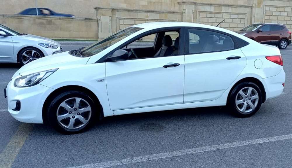 Hyundai Accent, 2012 il, 1.4 L, 251 000 km